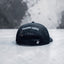 Casquette trucker noire “POULETTES SISTERS” – Visière damier noir & blanc