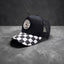 Casquette trucker noire “POULETTES SISTERS” – Visière damier noir & blanc