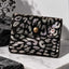 Leopard print shiny laminated leather coin purse, made in Italy